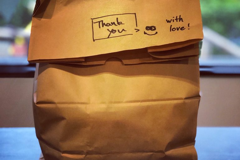 brown bag with kind thank you message