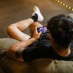 guy gaming on the couch