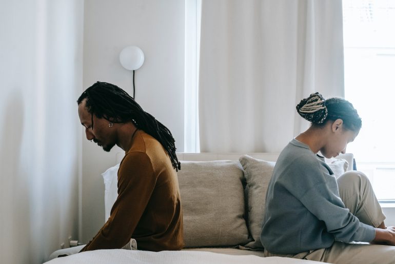 stressed black couple discussing divorce