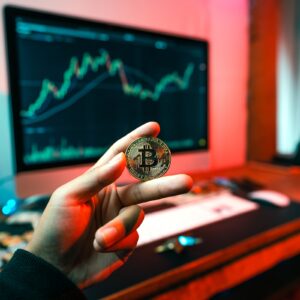 holding a crypto coin